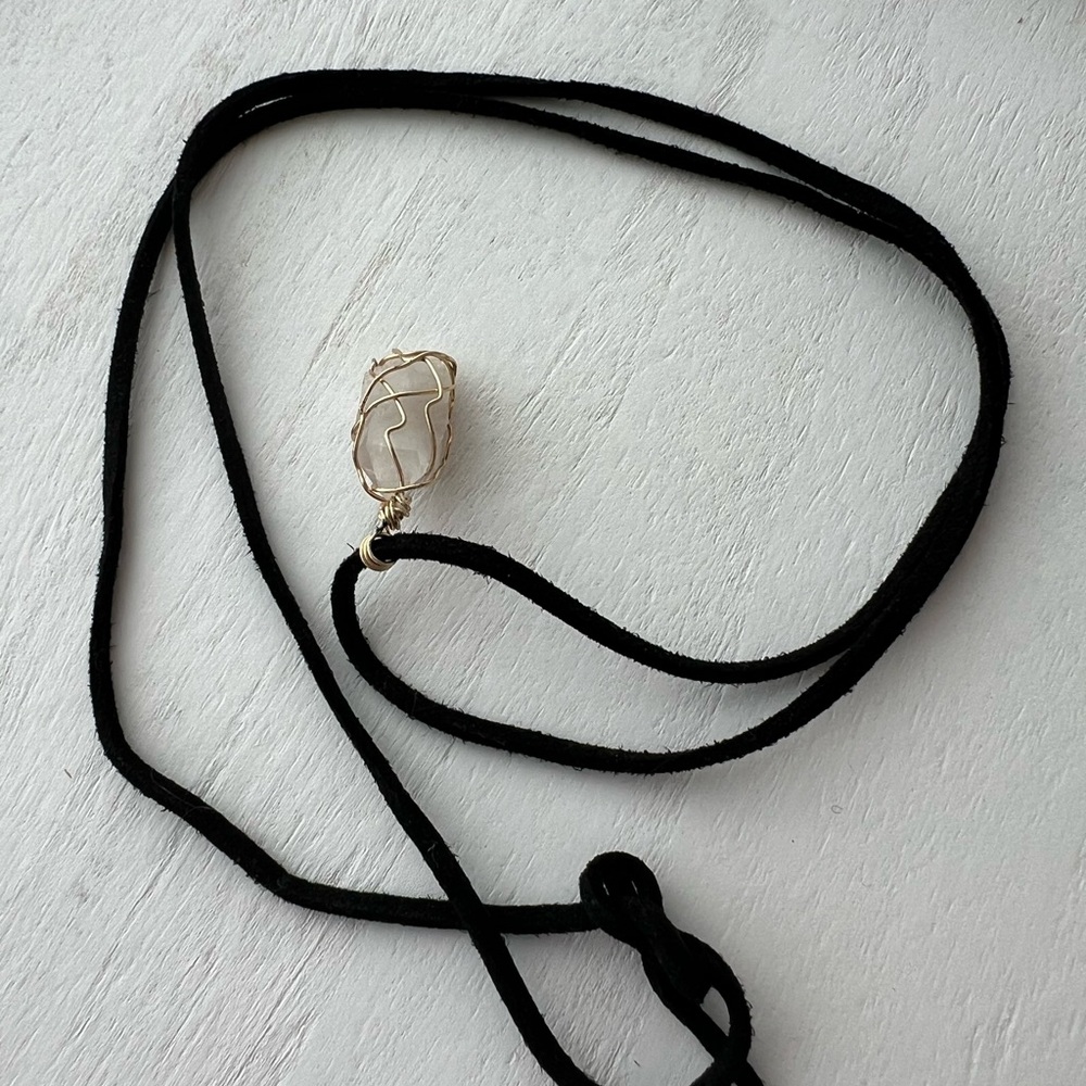 Crystal necklace with black leather chord